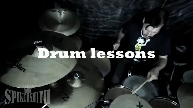 Spike playing drums